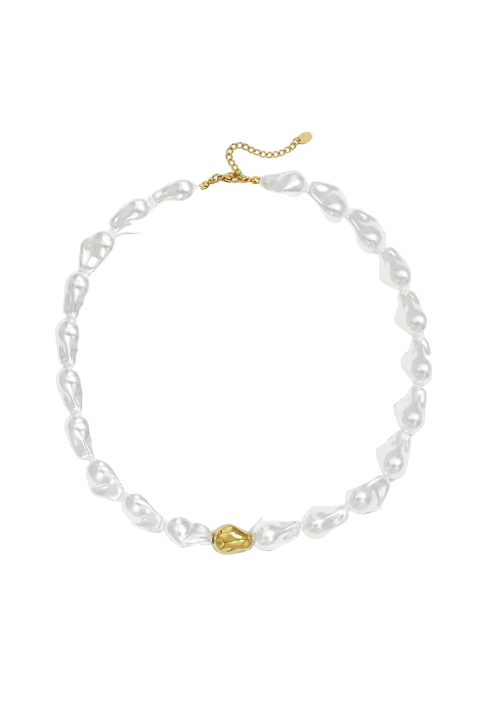 Baroque pearl necklace with a gold sculptural accent bead