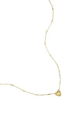 A gold-plated stainless steel chain necklace featuring a central beaded-border heart pendant, cylindrical bar links, a small clear cubic zirconia stone, and a tiny pearl accent. adore-beaded-heart-station-necklace.webp