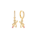 Gold pavé crystal huggie earrings with 3D sculptural gold teddy bear charms holding pink crystal teardrops, on a white background — Amie Teddy Bear Pavé Huggie Earrings by Ailani Jewels