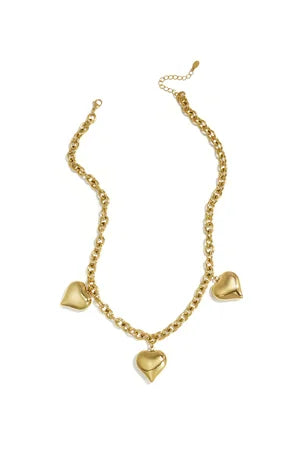 A chunky gold-plated stainless steel link chain necklace featuring three large, high-polish three-dimensional puffy heart charms. amour-necklace.webp