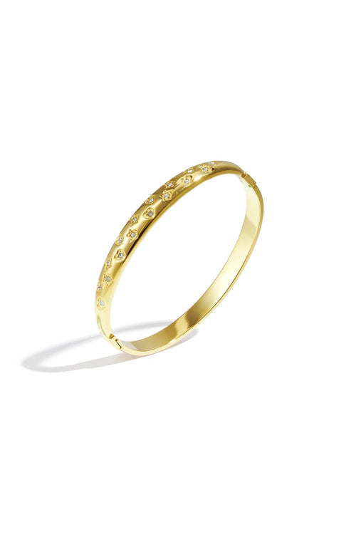 A gold-plated stainless steel hinged bangle featuring engraved heart and starburst motifs with embedded cubic zirconia crystals against a white background. aurelia-engraved-heart-celestial-star-bangle.webp