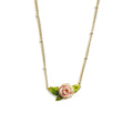 A gold-plated satellite chain necklace by Bill Skinner featuring an integrated 3D rose pendant hand-painted with cream, blush pink, and green leaf enamel.