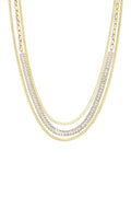 A gold-plated stainless steel multi-layered necklace featuring two flat herringbone chains framing a paperclip link chain with channel-set baguette cubic zirconia crystals against a white background. celeste-layered-herringbone-baguette-crystal-necklace.webp