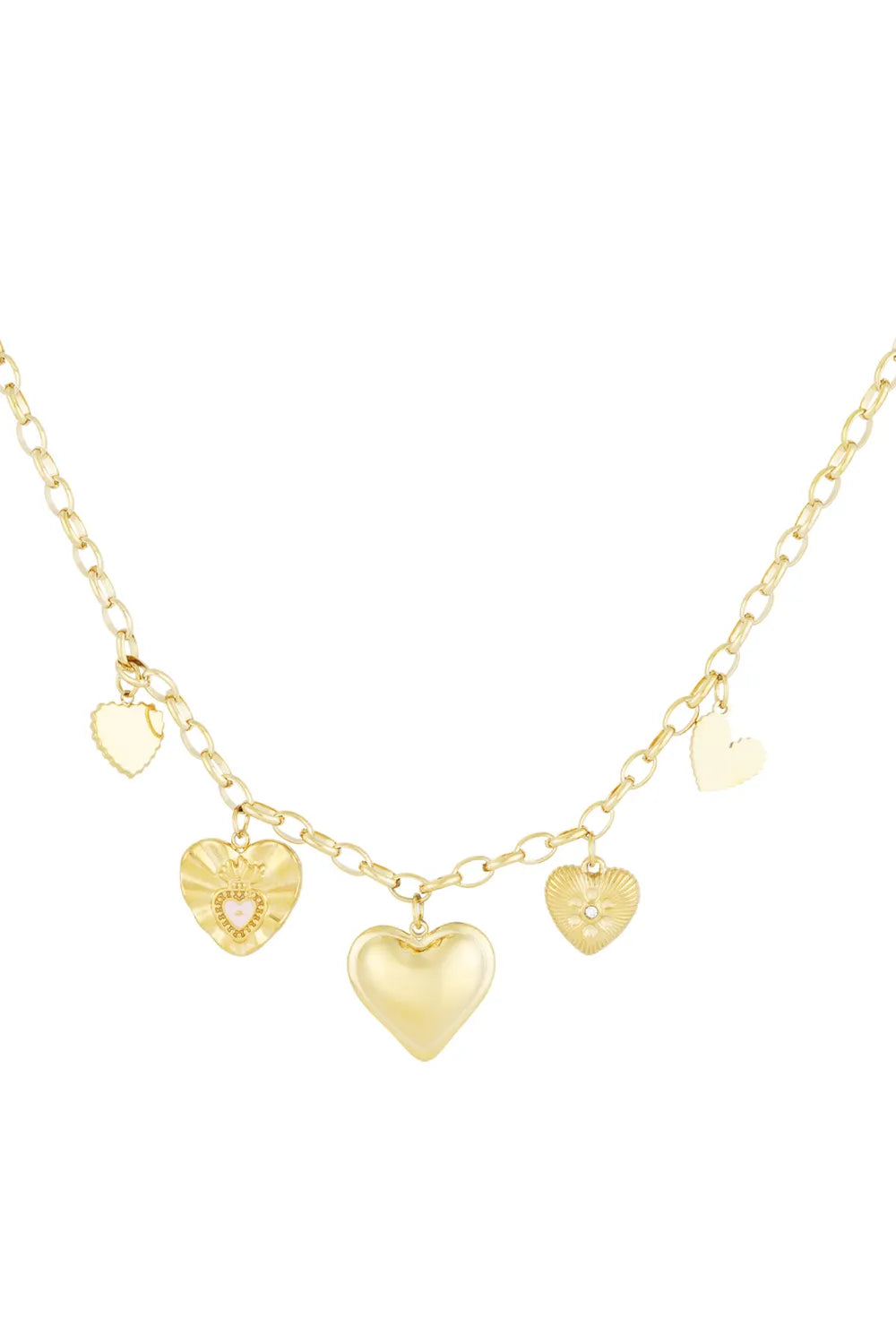 A gold-plated charm necklace featuring an oval link chain adorned with five different dangling heart charms, including a central 3D puffy heart, a sacred heart with a pink center, a textured sunburst heart with a crystal, and two small flat heart tags. cherie-amour-multi-heart-charm-necklace.webp