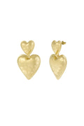 A pair of gold-plated drop earrings featuring a vertical cascade of two 3D puffy hearts detailed with a textured hammered finish and smooth raised borders. cherie-hammered-double-heart-earrings.webp