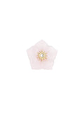 A gold-plated stainless steel statement ring featuring a top face crafted as a frosted translucent pastel pink flower with a gold sunburst center and a clear crystal. chloe-pastel-flower-statement-ring.webp