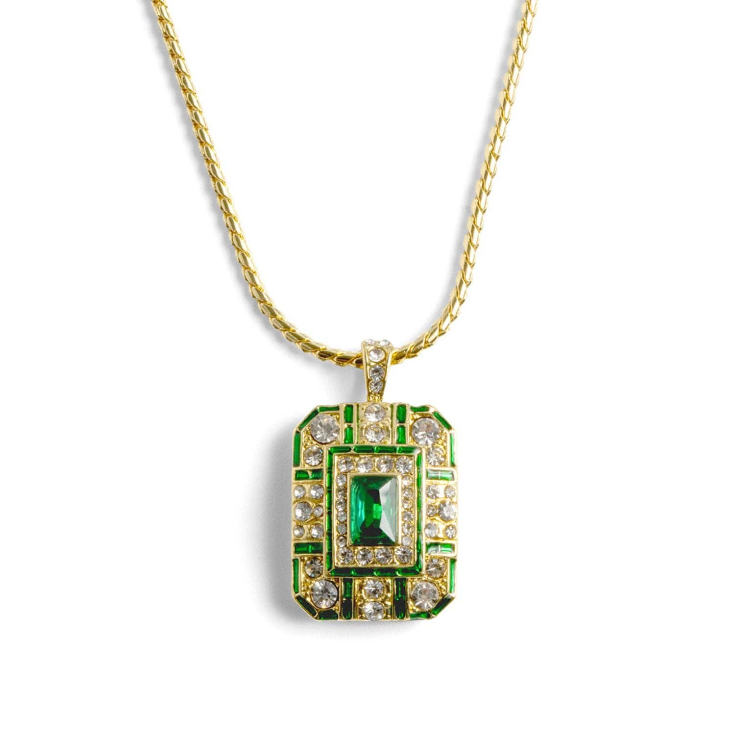 An ornate 14ct gold-plated Art Deco pendant necklace featuring a rectangular emerald crystal centered on a geometric shield with green enamel and clear crystals.