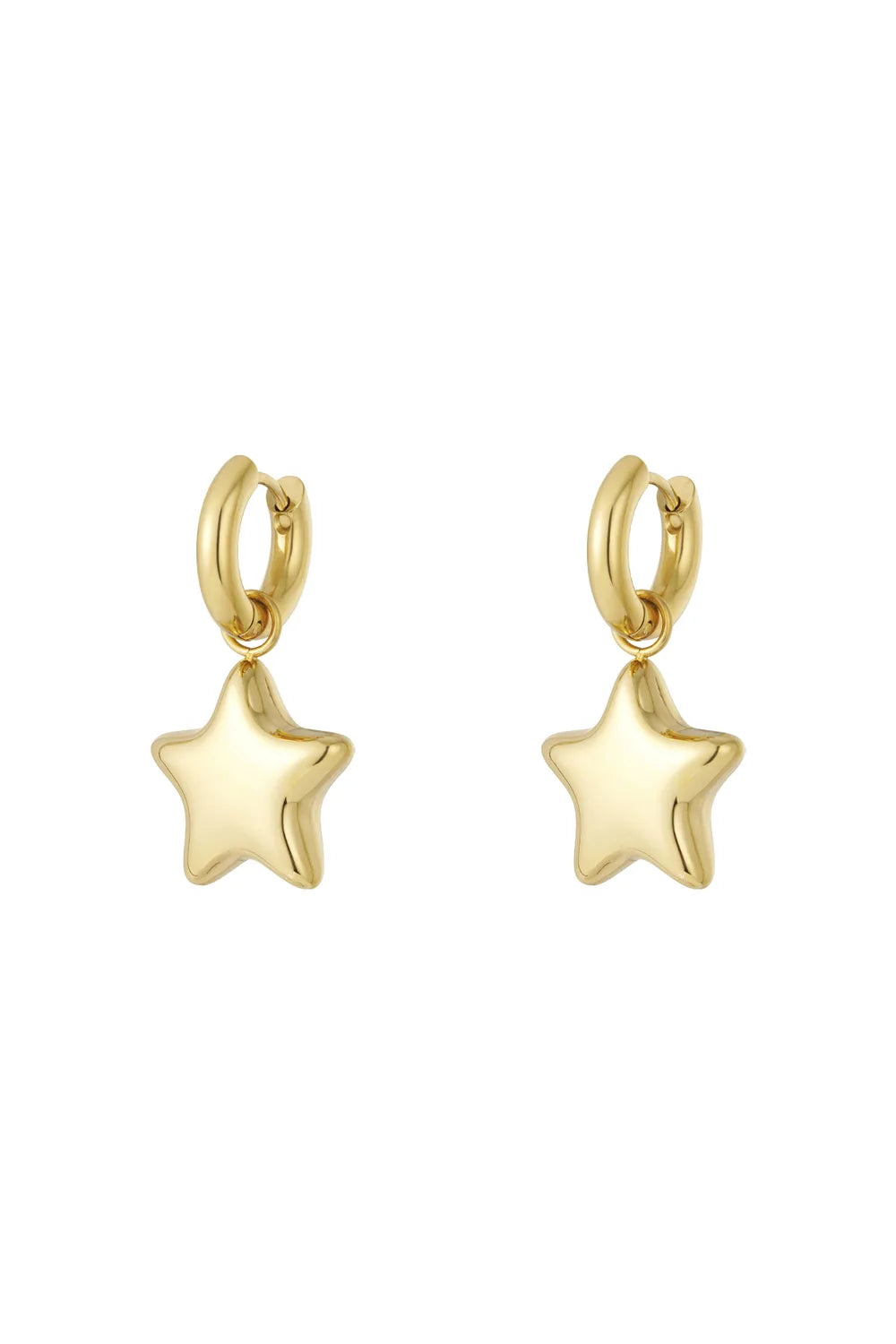 A pair of gold-plated stainless steel huggie hoop earrings featuring a dangling, high-polish three-dimensional puffy star charm against a white background. cometa-puffy-star-huggie-earrings.webp