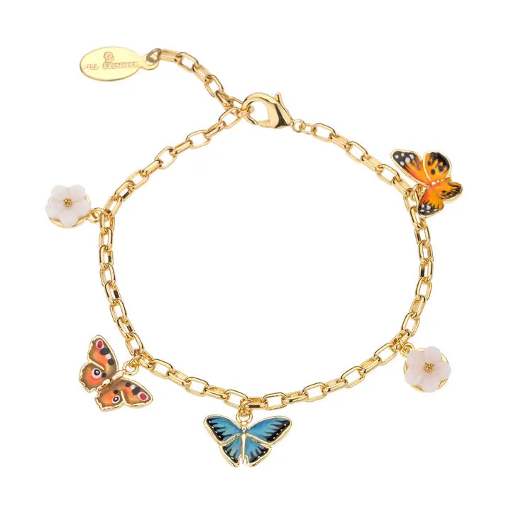 A gold-plated charm bracelet by Bill Skinner featuring hand-painted enamel charms of a blue butterfly, an orange butterfly, an earth-tone butterfly, and two white flowers on a link chain. bill-skinner-butterfly-charm-bracelet.webp
