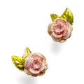 A pair of gold-plated stud earrings by Bill Skinner featuring realistic 3D English rose blooms hand-painted with soft pink enamel and accented with green leaves. bill-skinner-rose-stud-earrings.webp