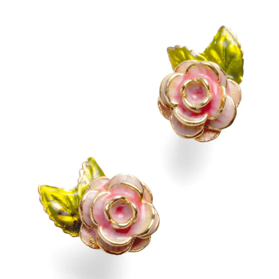A pair of gold-plated stud earrings by Bill Skinner featuring realistic 3D English rose blooms hand-painted with soft pink enamel and accented with green leaves. bill-skinner-rose-stud-earrings.webp