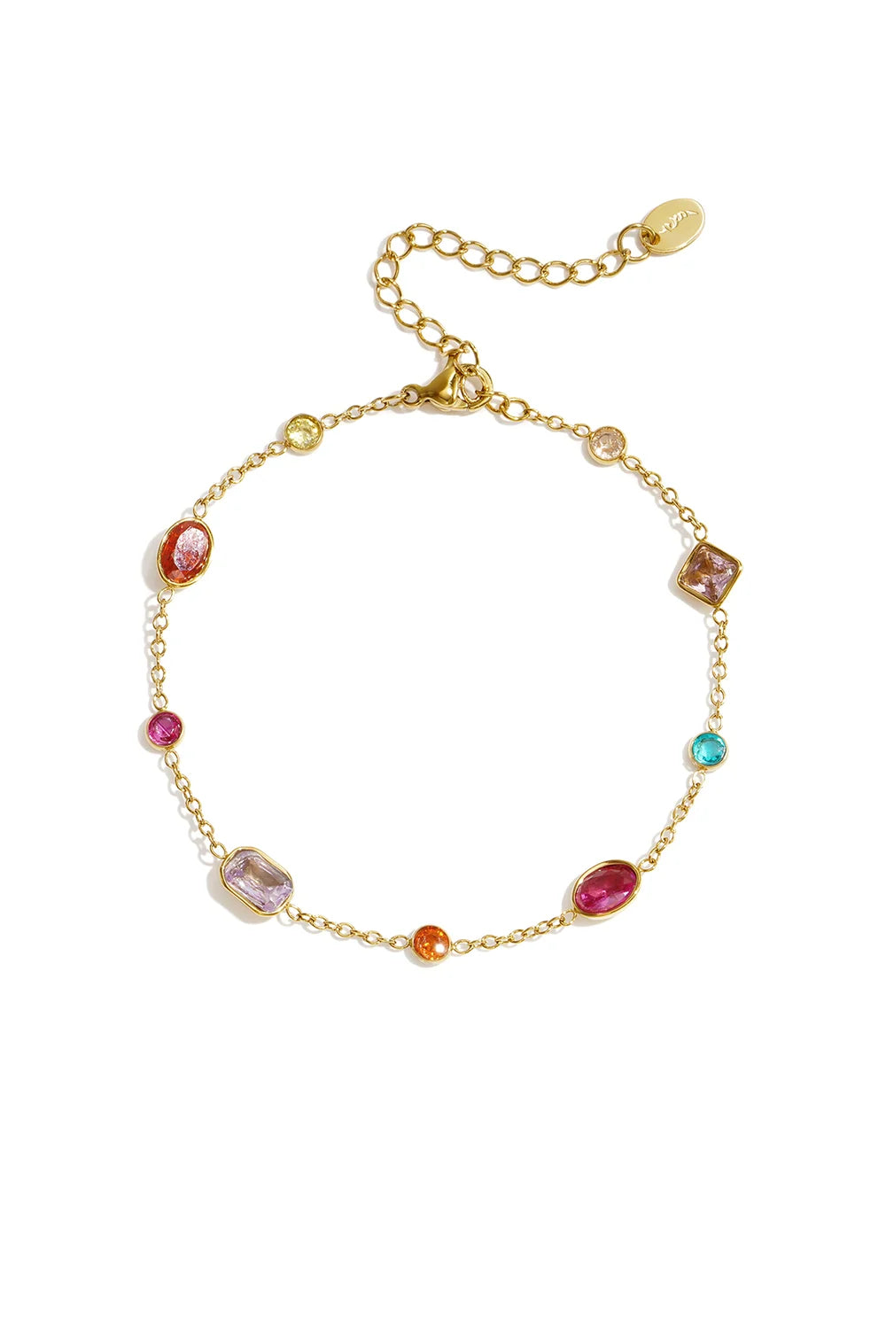 A delicate gold-plated stainless steel chain bracelet featuring various shapes of colourful cubic zirconia gemstone stations against a white background. iris-multi-gemstone-station-bracelet.webp