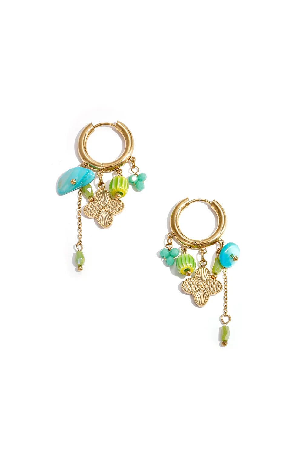 Pair of gold huggie hoop earrings featuring a cluster of charms including a gold clover, turquoise stone, and green glass beads with a chain drop on a white background.