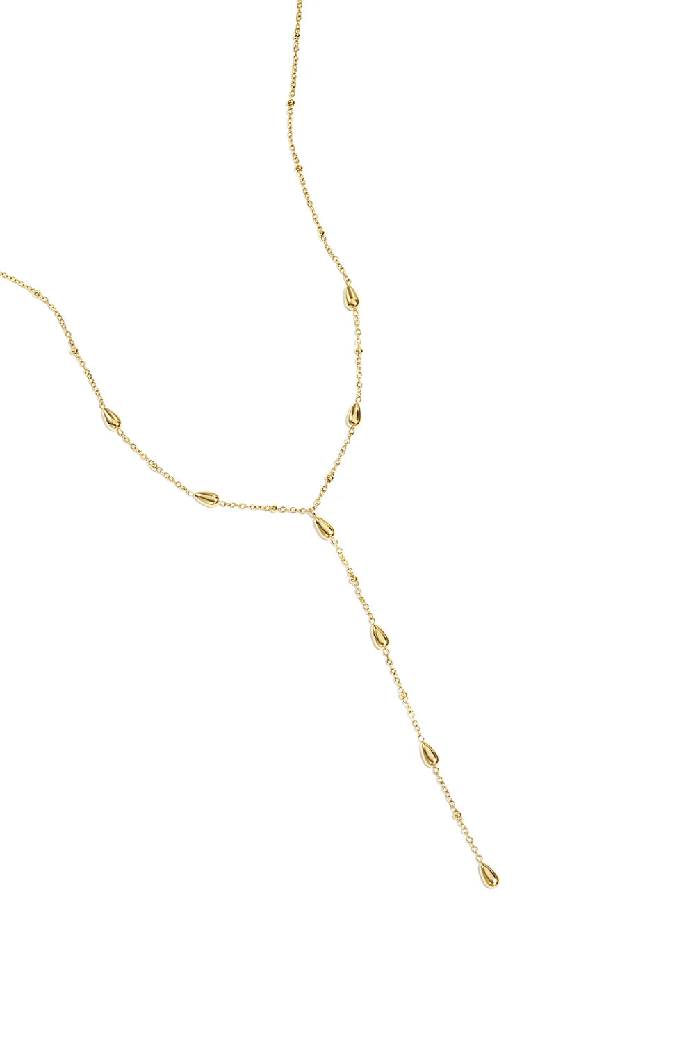 A delicate gold-plated Y-necklace featuring a fine chain adorned with small dangling smooth 3D teardrop stations along the neckline and vertical drop. larme-drop-teardrop-y-necklace.webp