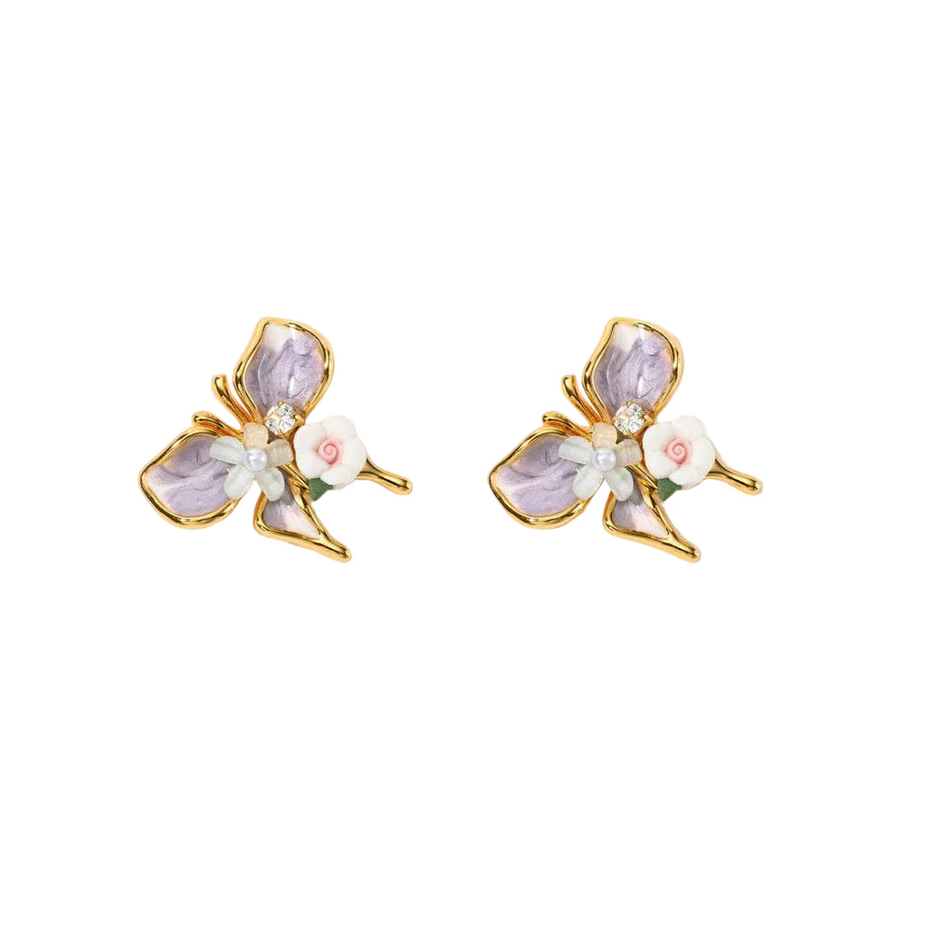A pair of gold-plated Verdivine stud earrings shaped like butterflies with marbled purple enamel wings, adorned with a white and pink rose and small clear crystals.