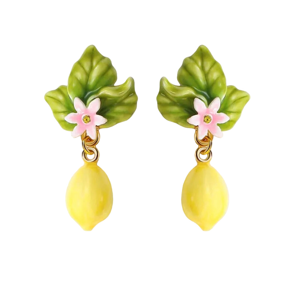 Pair of hand-painted enamel drop earrings featuring green leaves, a small pink blossom with a yellow crystal center, and a hanging glossy yellow lemon pendant.