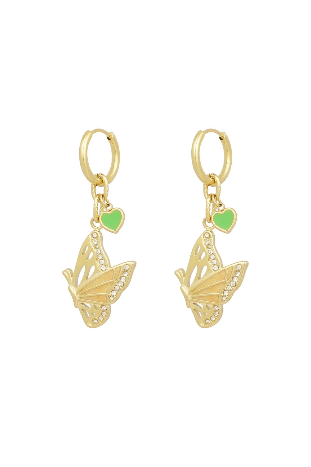 A pair of gold-plated huggie hoop earrings featuring a dangling side-profile butterfly charm with crystals and an open-work wing, paired with a small pastel green enamel heart charm. mariposa-butterfly-heart-earrings.webp