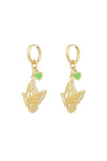A pair of gold-plated huggie hoop earrings featuring a dangling side-profile butterfly charm with crystals and an open-work wing, paired with a small pastel green enamel heart charm. mariposa-butterfly-heart-earrings.webp