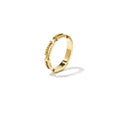 A gold-plated stainless steel band ring featuring a contemporary geometric pattern with rectangular cutouts and fine ribbed track textures. mila-cutout-textured-band-ring.webp