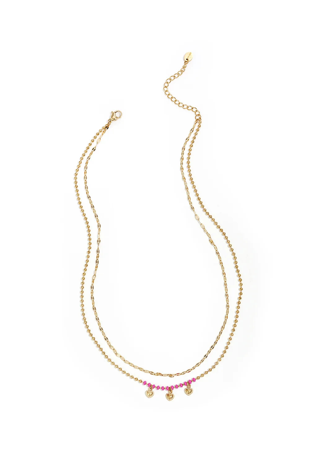 A gold-plated stainless steel multi-layer necklace featuring a top tier textured gold chain and a bottom tier gold satellite chain decorated with hot pink seed beads and three small hanging heart charms. mimi-multi-layer-heart-fringe-necklace.webp