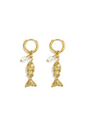 A pair of gold-plated stainless steel huggie hoop earrings featuring a dangling textured 3D gold fish charm and a small white pearl accent against