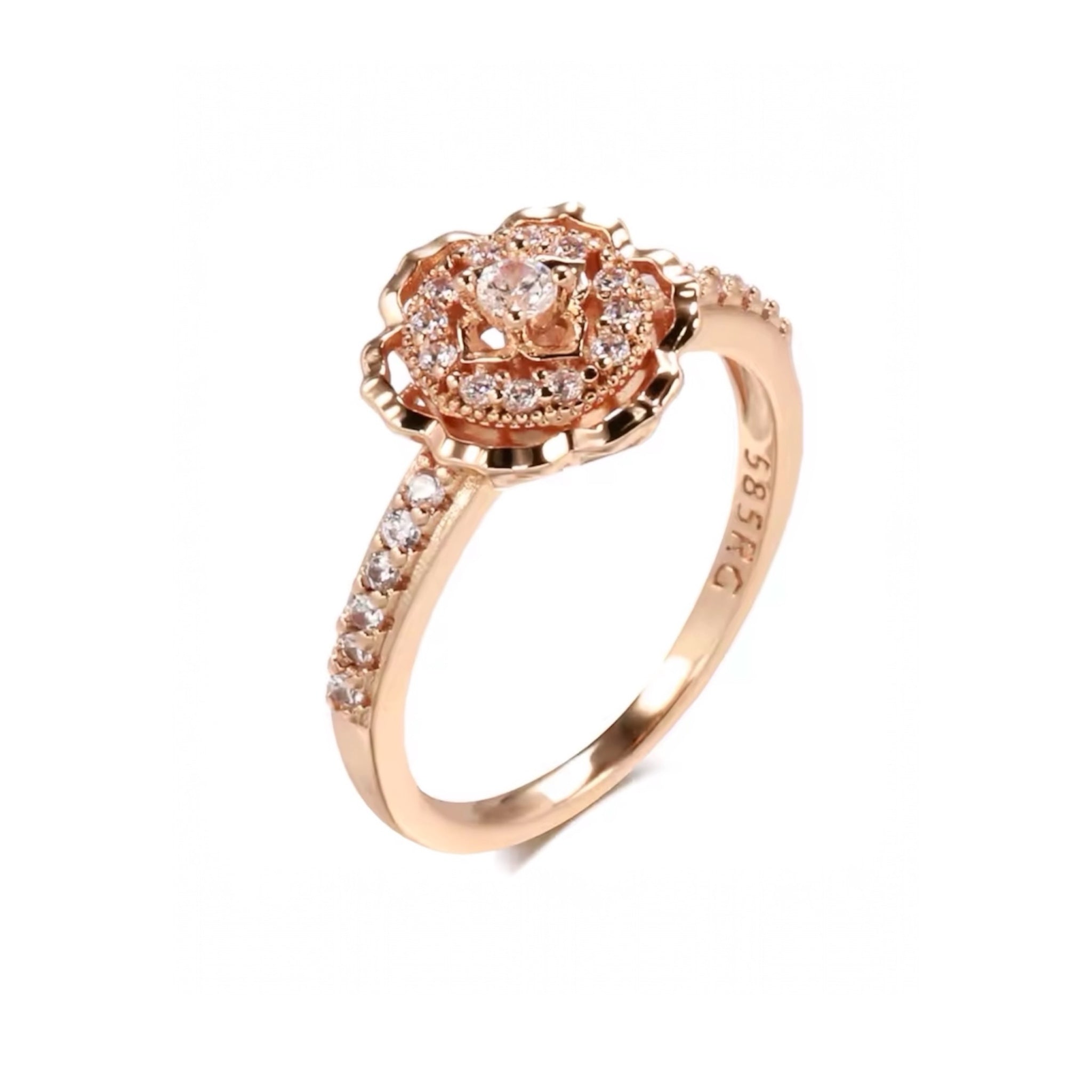 A 585 plated rose gold statement ring featuring a layered camellia flower shape encrusted with clear white crystals and a crystal-lined band on a white background.