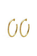 Pair of medium-sized gold C-hoop earrings with a brushed matte texture and butterfly post backings, shown on a white background.