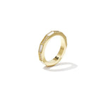 A gold-plated stainless steel ring featuring a faceted geometric band inlaid with alternating segments of white mother-of-pearl and small sparkling cubic zirconia crystals. sienne-mother-of-pearl-ring.webp