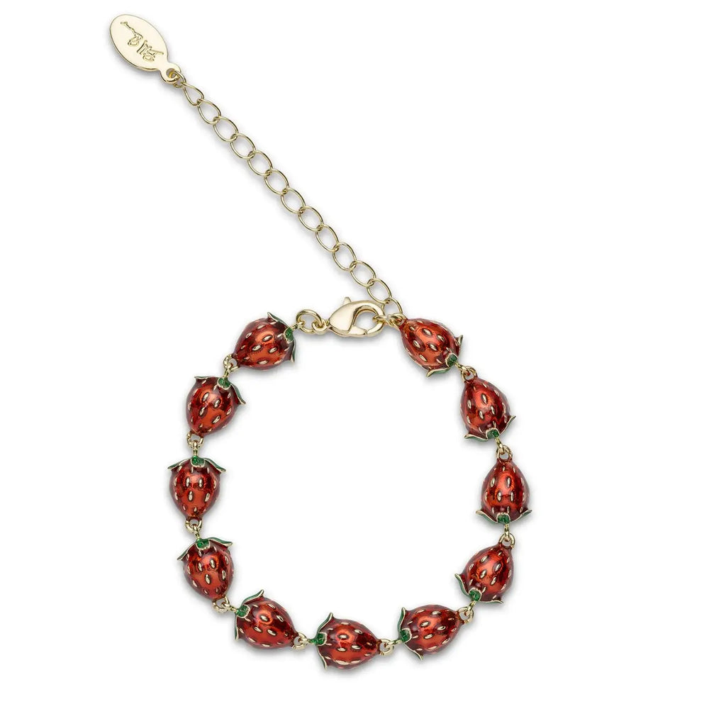 A gold-plated link bracelet by Bill Skinner featuring a continuous row of 3D strawberry charms coated in glossy translucent red and green enamel.