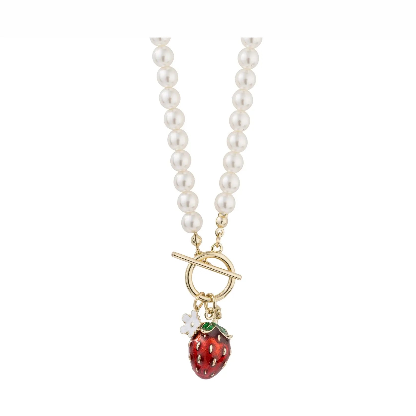 A faux pearl strand necklace by Bill Skinner featuring a front gold-plated toggle clasp suspending a hand-painted 3D red strawberry charm and a small white flower charm.