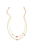 A gold double-strand necklace featuring heart and flower charms with pink and orange beads, displayed on a white background.